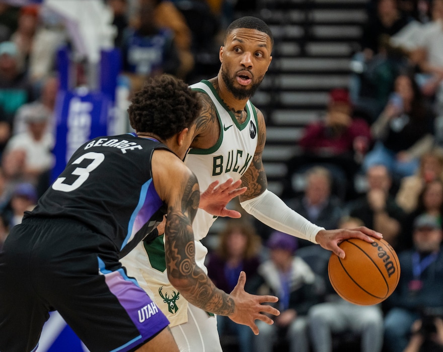 (Rick Egan | The Salt Lake Tribune)  Milwaukee Bucks guard Damian Lillard (0) is guarded by Utah Jazz guard Keyonte George (3), in NBA action at the Delta Center, on Monday, Jan 27, 2025.