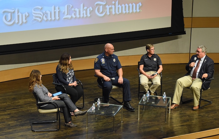 (Francisco Kjolseth | The Salt Lake Tribune) Tribune Editor Jennifer Napier-Pearce moderates a conversation with police officers and firefighters about mental health at the Salt Lake Public Library on Thursday, May 24, 2018. Panelists included Shante Johnson, spokesman for the Utah State Lodge Fop (Fraternal Order of Police) and the widow of Sgt. Derek Johnson, who was killed in the line of duty, Salt Lake City Fire Capt. Mike Stevens, an advocate for better mental health care for firefighters, Sgt. Lisa Pascadlo, peer-support coordinator at the Salt Lake City Police Department and Rep. Lee Perry, R-Perry, a Utah Highway Patrol lieutenant, who sponsored a new bill to provide confidentiality to first responders who talk to peer-support groups.