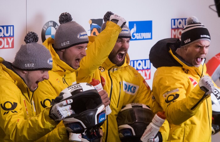 (Rick Egan  |  The Salt Lake Tribune)   Four - Man Bobsleigh team, Friedrich Francesco, Jannis Baecker, Martin Grothkopp, and Thorsten Margis, celebrated their first place standing, as the USA finished in second place, in the BMW IBSF World Cup 4-Man Bobsleigh competition, in Park City, Saturday, November 18, 2017.