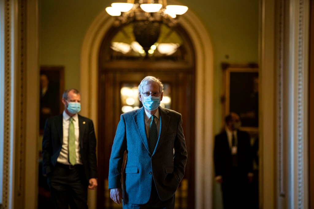 (Al Drago | The New York Times) Majority Leader Mitch McConnell (R-Ky.) walks to his office from the Senate floor of the Capitol, Dec. 3, 2020. "If we can’t get a Covid-19 relief package through Congress in the next week or two, we’re sunk," writes New York Times columnist David Brooks.