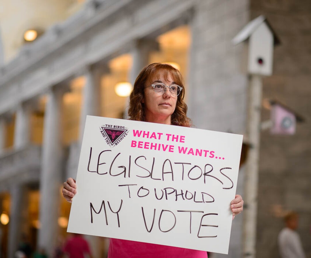(Trent Nelson | The Salt Lake Tribune)  Colleen Hough and other supporters of Planned Parenthood Association of Utah gathered in a silent protest in the Utah State Capitol Rotunda Friday March 1, 2019, while a 12-foot birdhouse art installation broadcast statements from Utah constituents.