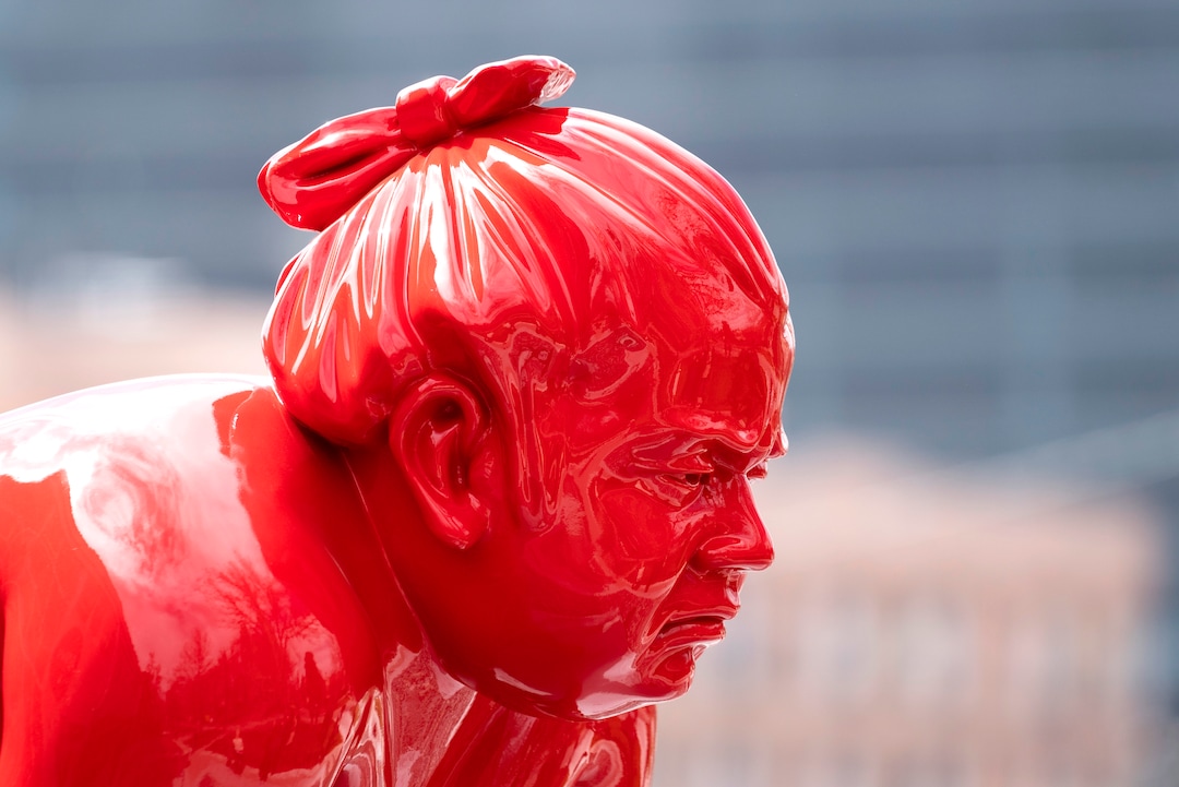 (Rick Egan | The Salt Lake Tribune)  A new art installation of a life-size sumo wrestler, in front of the Mountain West Commercial Real Estate building, previously the KALL Radio 910 broadcast station, on South Temple, in Salt Lake City, on Monday, March 29, 2021