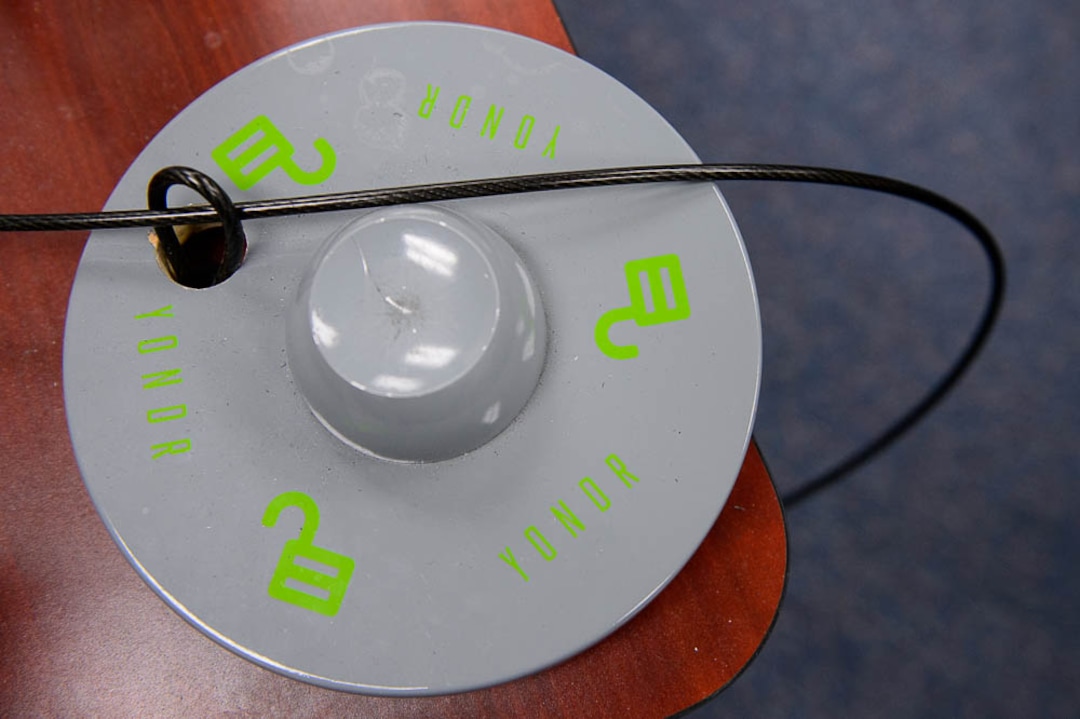 (Trent Nelson | The Salt Lake Tribune) Students in Monta Thomas' classes at Brighton High School in Cottonwood Heights use this device, secured to their teacher's desk, to unlock the pouches holding their cellphones at the end of each class period.