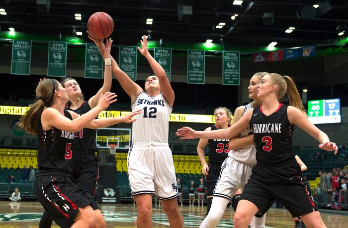 Scott Sommerdorf | The Salt Lake TribuneLauren Gustin grabs a second half rebound. Salem Hills beat Hurricane 57-35 for the 4A girl's title, Saturday, March 3, 2018.