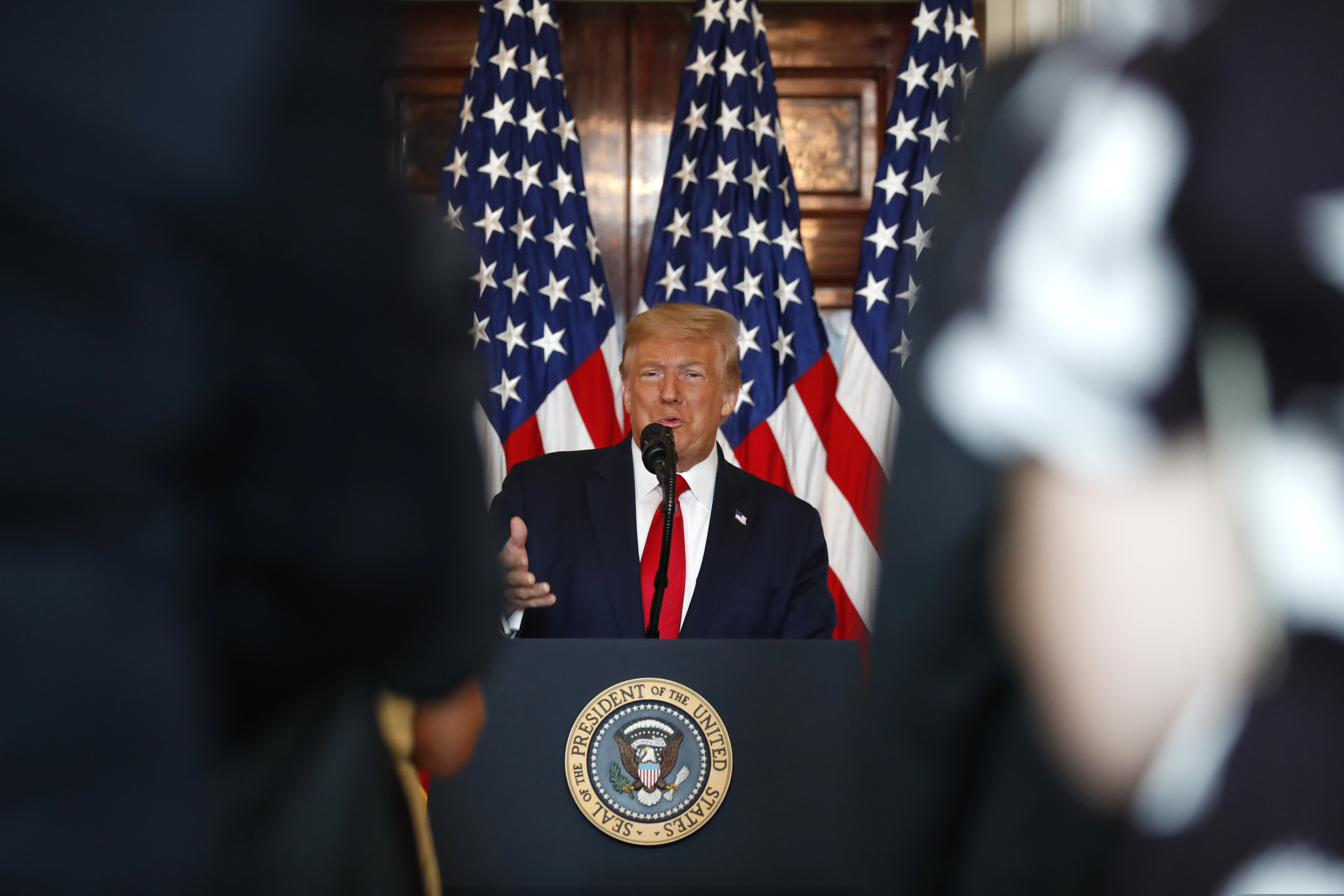 (Alex Brandon | AP) President Donald Trump speaks during an event to present the Presidential Medal of Freedom to Jim Ryun, in the Blue Room of the White House, Friday, July 24, 2020, in Washington.
