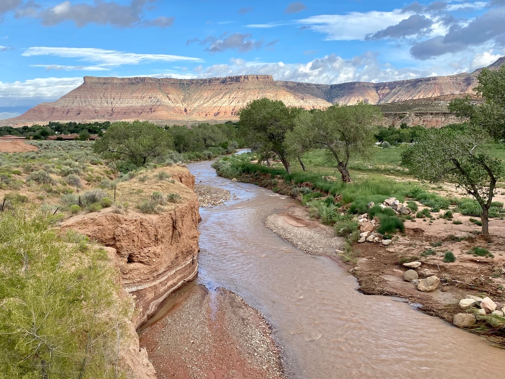 (Mark Eddington | The Salt Lake Tribune) The Virgin River as seen near a bluff near Virgin, Utah, on Monday, Aug. 21, 2023. Tropical Storm Hilary's effects will be felt in southern Utah through Tuesday, with rain and flash flooding possible.