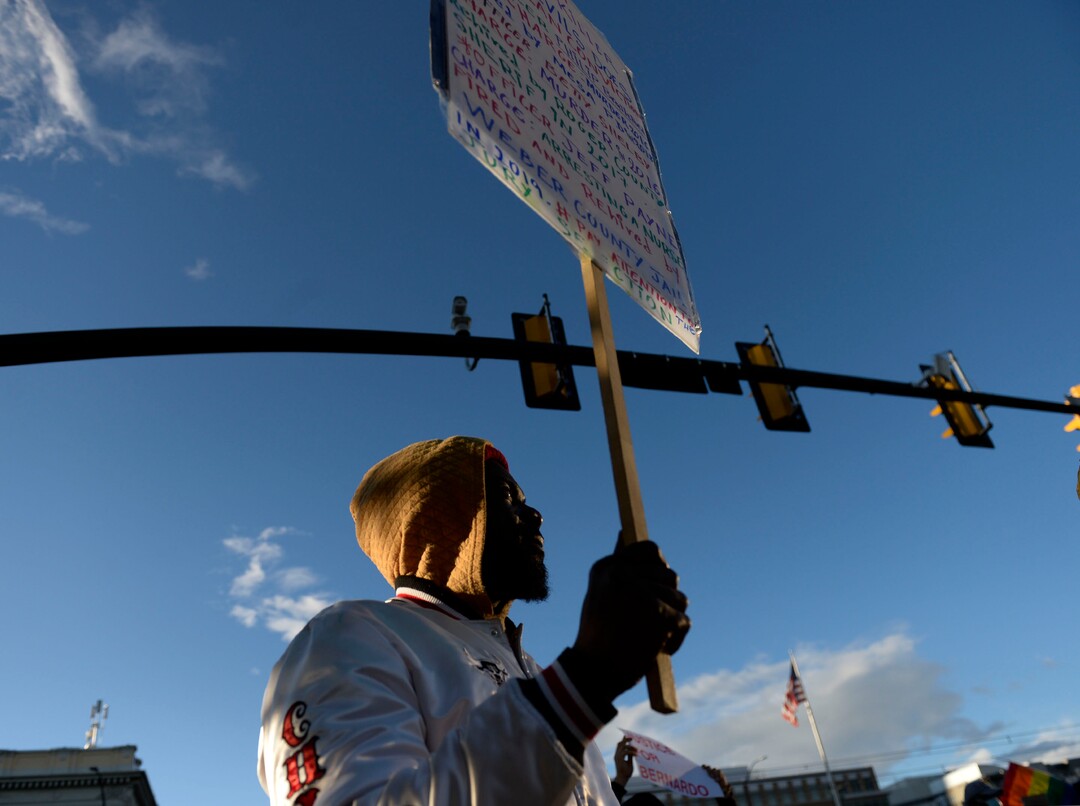 (Leah Hogsten  |  The Salt Lake Tribune) Demonstrators with Black Lives Matter marched from the Utah Capitol down State Street, stopping at every intersection for five minutes in honor of George Floyd, June 8, 2020.