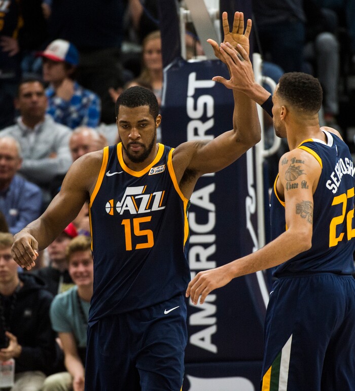 (Rick Egan  |  The Salt Lake Tribune)   Utah Utah Jazz forward Thabo Sefolosha (22) high-five's Jazz forward Derrick Favors (15) after he scored and was fouled by Cleveland Cavaliers guard Dwyane Wade (9), in NBA action Utah Jazz vs Cleveland Cavaliers, in Salt Lake City,  Saturday, December 30, 2017.


