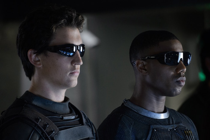 This photo provided by Twentieth Century Fox shows Miles Teller, left, as Dr. Reed Richards, and Michael B. Jordan as Johnny Storm, in a scene from the film, "Fantastic Four," releasing in U.S. theaters on Aug. 7, 2015. (Ben Rothstein/Twentieth Century Fox via AP)