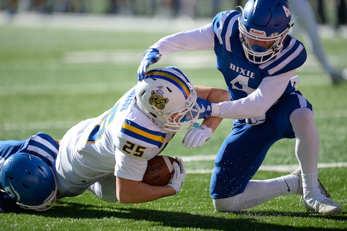 (Francisco Kjolseth  |  The Salt Lake Tribune)  Orem's Brinton Paulson nears the end zone over Dixie in the 4A high school championship game at Rice Eccles Stadium in Salt Lake City, Friday, Nov. 16, 2018.
