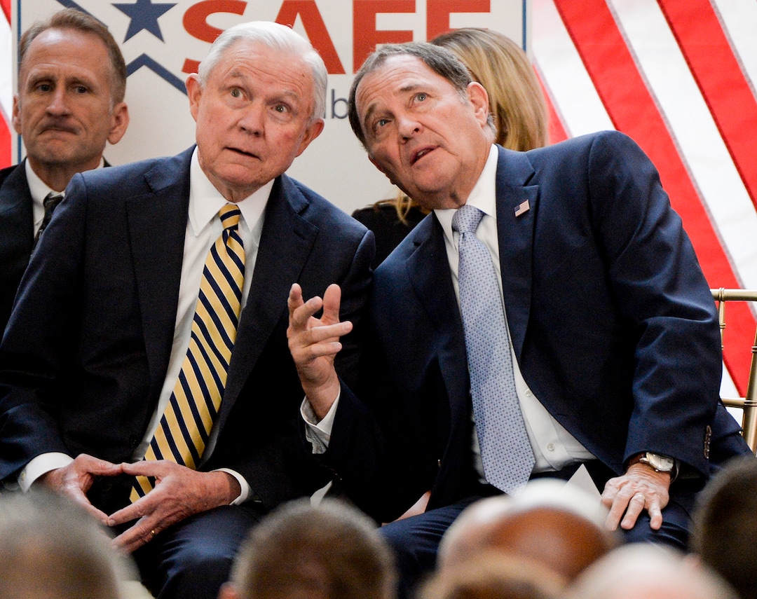 Leah Hogsten  |  The Salt Lake Tribune   Utah Governor Gary Herbert (right) points to artwork in the Capitol rotunda to U.S. Attorney General Jeff Sessions. Sessions touted Project Safe Neighborhoods, Wednesday, October 3, 2018, at the Utah Capitol, on the one year anniversary since the Trump administration returned to the policy pushed by the George W. Bush administration. Under Project Safe Neighborhoods, federal prosecutors focus on security stiff sentences for those convicted of gun crimes and reducing violent crimes.