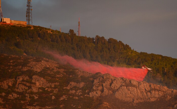 (Francisco Kjolseth  |  The Salt Lake Tribune)  Crews battle a grass fire in Tooele county being dubbed the Green Ravine fire as it burns on Tuesday, Sept. 3, 2019.