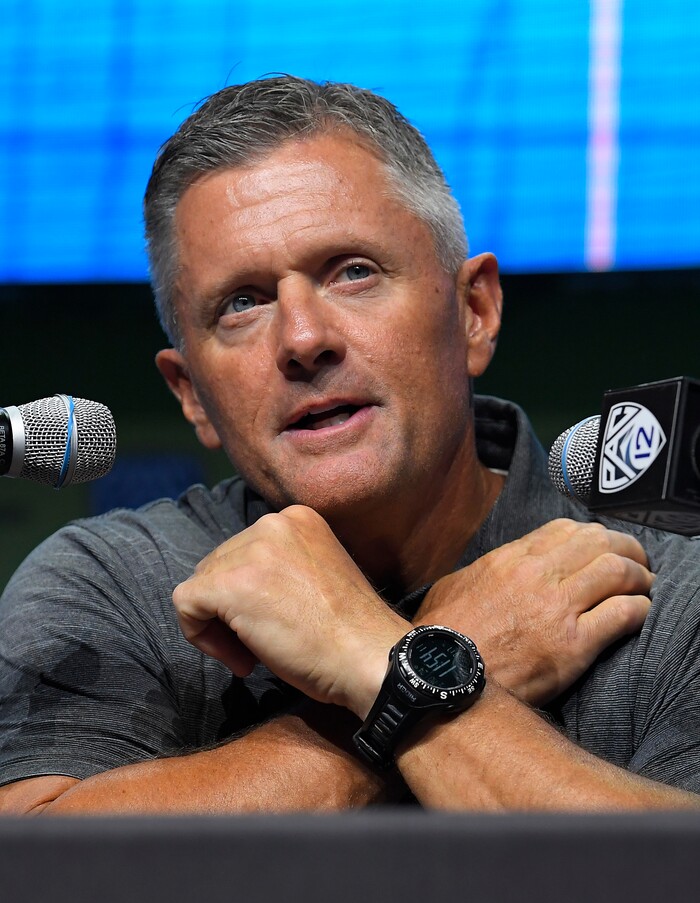 FILE - In this July 27, 2017, file photo, Utah head coach Kyle Whittingham speaks at Pac-12 NCAA college football Media Day, in the Hollywood section of Los Angeles. Utah is growing into a defensive back factory as the Utes are regularly sending cornerbacks and safeties to the NFL, including four off the 2016 roster. Coach Kyle Whittingham thinks the 2017 defensive backfield could be even better. (AP Photo/Mark J. Terrill, File)