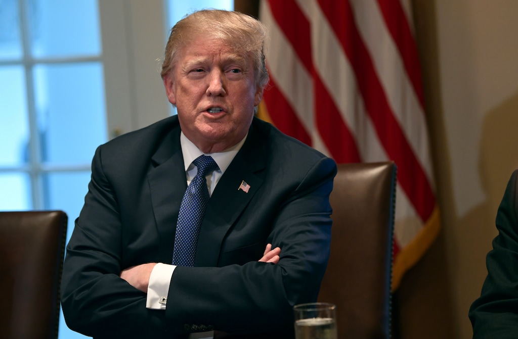 President Donald Trump speaks in the Cabinet Room of the White House in Washington, Monday, April 9, 2018, at the start of a meeting with military leaders. Federal agents raided the office of Trump's personal attorney Michael Cohen, seizing records on topics including a $130,000 payment made to a porn actress who says she had sex with Trump more than a decade ago. The move ignited the president's anger, with Trump calling it a "disgrace" that federal agents "broke into" the office of his personal attorney. He also called special counsel Robert Mueller's investigation "an attack on our country." (AP Photo/Susan Walsh)