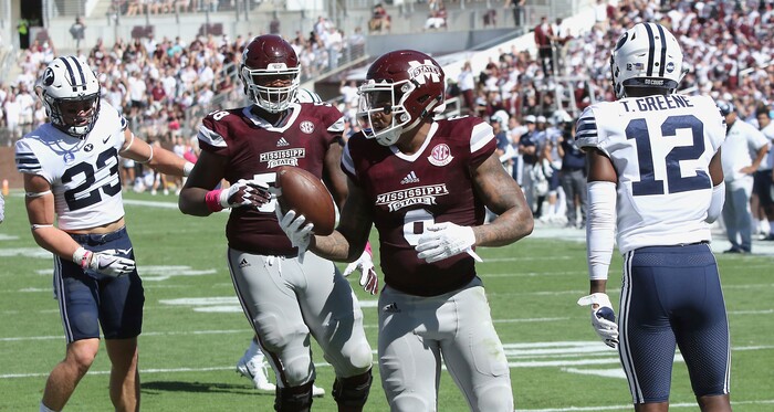 Mississippi State wide receiver Donald Gray (6) reacts after for a touchdown catch during the first half of an NCAA college football game against BYU in Starkville, Miss., Saturday, Oct. 14, 2017. (AP Photo/Jim Lytle)
