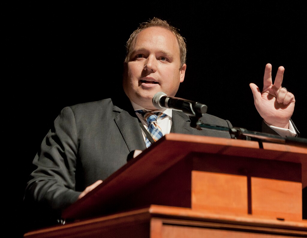(Michael Mangum | Special to the Tribune) Adam Gardiner speaks during the recorder election at the county republican Central Committee Meeting at Jordan High School in Sandy, UT on Thursday, August 17, 2017. Gardiner was elected Salt Lake county recorder.