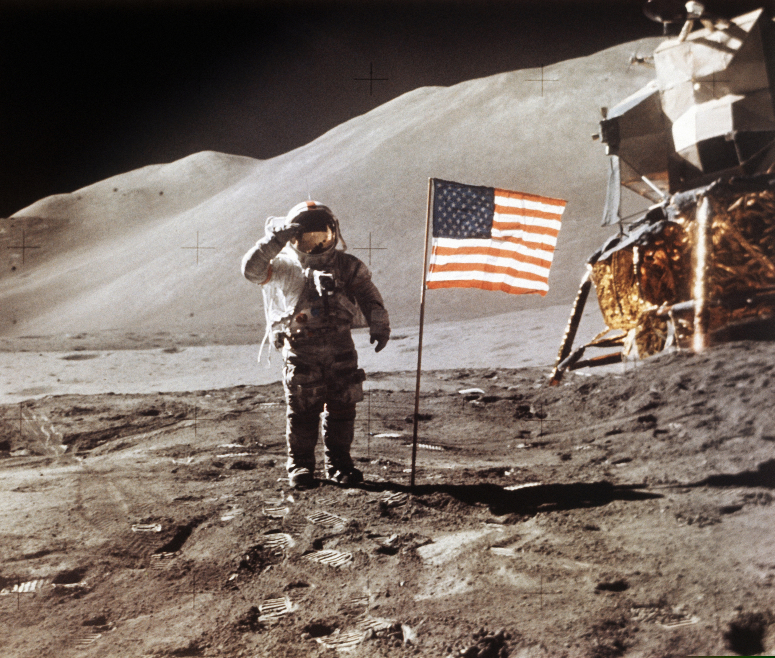 (NASA | The Associated Press) In this July 30, 1971 photo made available by NASA, Apollo 15 Lunar Module Pilot James B. Irwin salutes while standing beside the fourth American flag planted on the surface of the moon. On Tuesday, March 26, 2019, Vice President Mike Pence called for landing astronauts on the moon within five years.