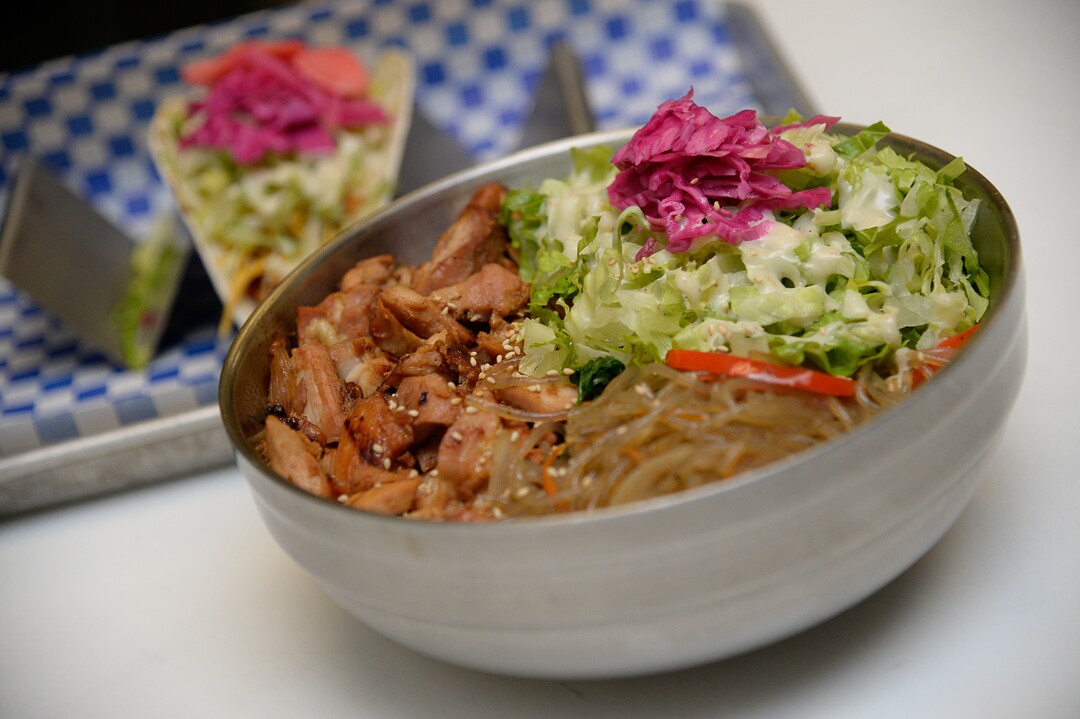 (Francisco Kjolseth  |  The Salt Lake Tribune) Rice noodles with chicken and street tacos at the Angry Korean fusion restaurant in South Jordan.