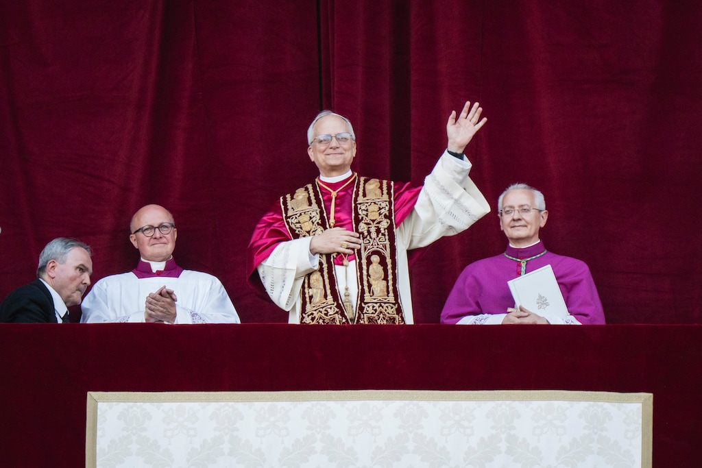 (Gianni Cipriano | The New York Times) Pope Leo XIV waves to the crowd after his election from the balcony of St. Peter’s Basilica in Vatican City, on Thursday, May 8, 2025. Robert Francis Prevost was elected the 267th pope of the Roman Catholic Church on Thursday, becoming the first pope from the U.S.