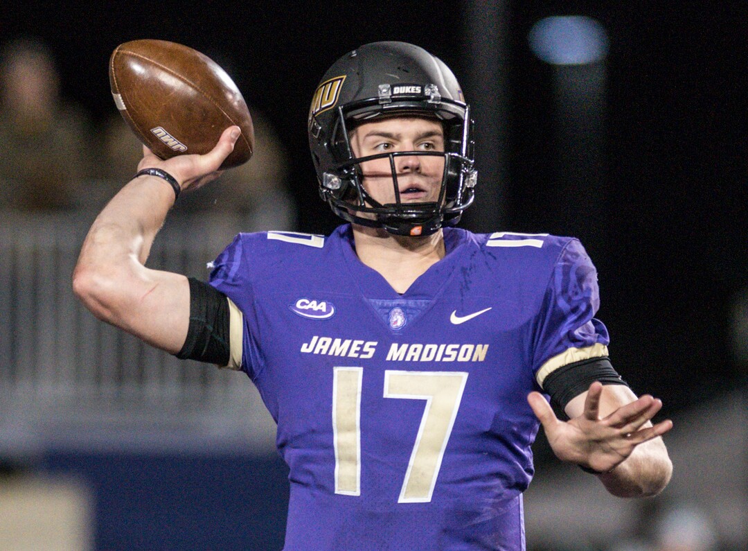 James Madison quarterback Bryan Schor throws against Weber State during the first half of an NCAA college football game in the quarterfinals of the FCS playoffs Friday, Dec. 8, 2017, in Harrisonburg, Va. (Daniel Lin/Daily News-Record via AP)