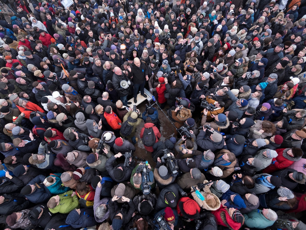 Protesters against the transfer of St. Isaac's Cathedral to the Russian Orthodox Church gather at the Marsovo field in St.Petersburg, Russia, Saturday, Jan. 28, 2017. Over 2,000 people rallied in St. Petersburg on Saturday to protest plans by the city authorities to give a landmark cathedral to the Russian Orthodox Church amid an increasingly passionate debate over the relationship between the church and state. (AP Photo/Dmitri Lovetsky)