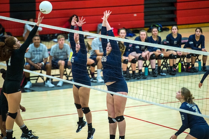 (Chris Detrick | The Salt Lake Tribune) West's Heleine FilipeÊ(1) his past Skyline's Cameron Mooney (26) and Skyline's Rebekah Grant (15) during the volleyball match at West High School Tuesday, October 3, 2017.
