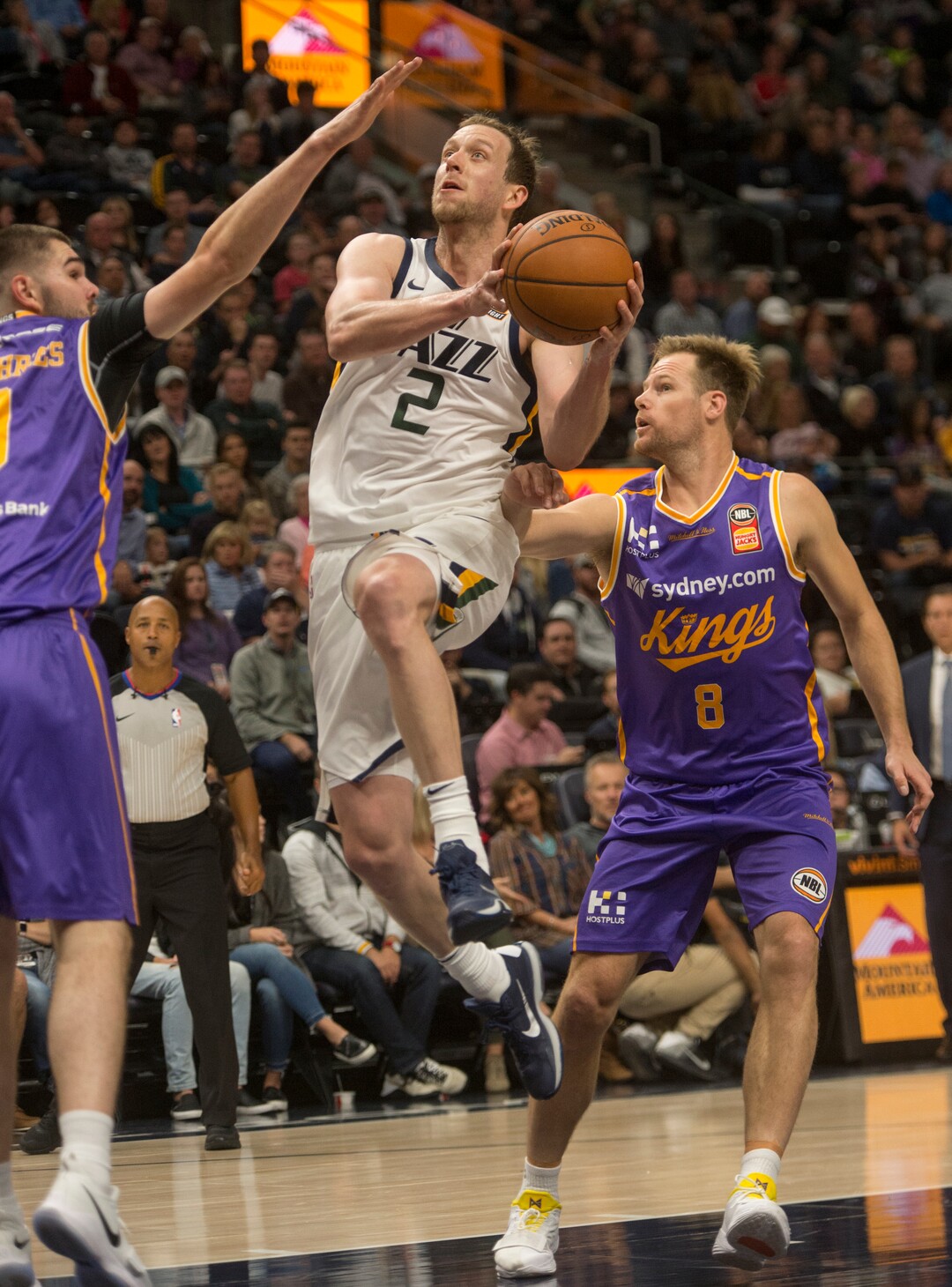 (Rick Egan  |  The Salt Lake Tribune)  Utah Jazz forward Joe Ingles (2) takes the ball to the hoop, as Sydney Kings guard Isaac Humphries (0) defends, in preseason basketball Utah Jazz vs.Sydney Kings, in Salt Lake City, Sunday, October 2, 2017.