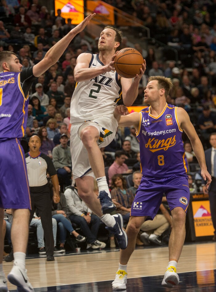(Rick Egan  |  The Salt Lake Tribune)  Utah Jazz forward Joe Ingles (2) takes the ball to the hoop, as Sydney Kings guard Isaac Humphries (0) defends, in preseason basketball Utah Jazz vs.Sydney Kings, in Salt Lake City, Sunday, October 2, 2017.


