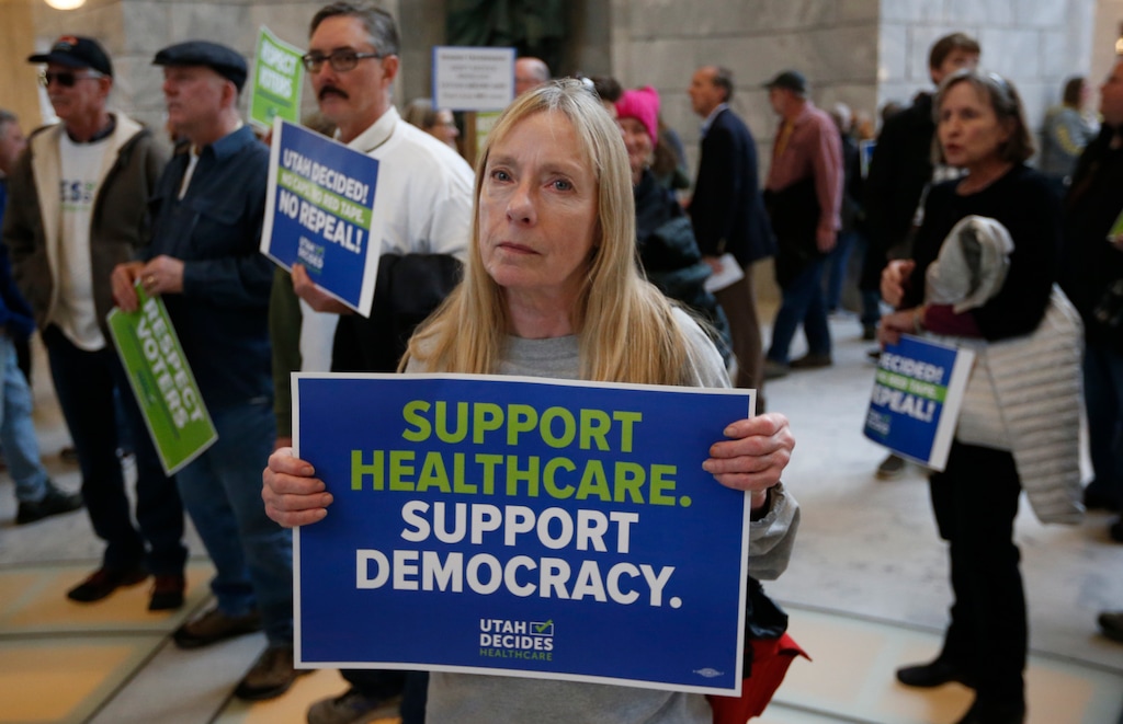 Supporters of Medicaid expansion rally at the Capitol in Salt Lake City in 2019. (AP Photo/Rick Bowmer, File)