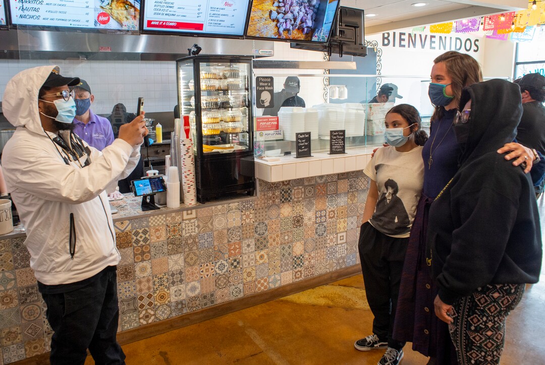 (Rick Egan | The Salt Lake Tribune) Salt Lake City Mayor Erin Mendenhall poses for a photo with customers at Santo Taco, after a news conference encouraging citizens to keep wearing masks, after the state mask mandate ends, Friday, March 19, 2021.