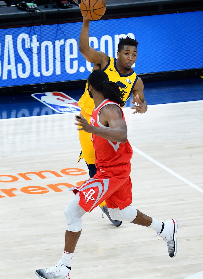 (Scott Sommerdorf | The Salt Lake Tribune)
Utah Jazz guard Donovan Mitchell (45) passes during first half play. The Rockets led the Jazz 58-48 at the half, Sunday, May 6, 2018.