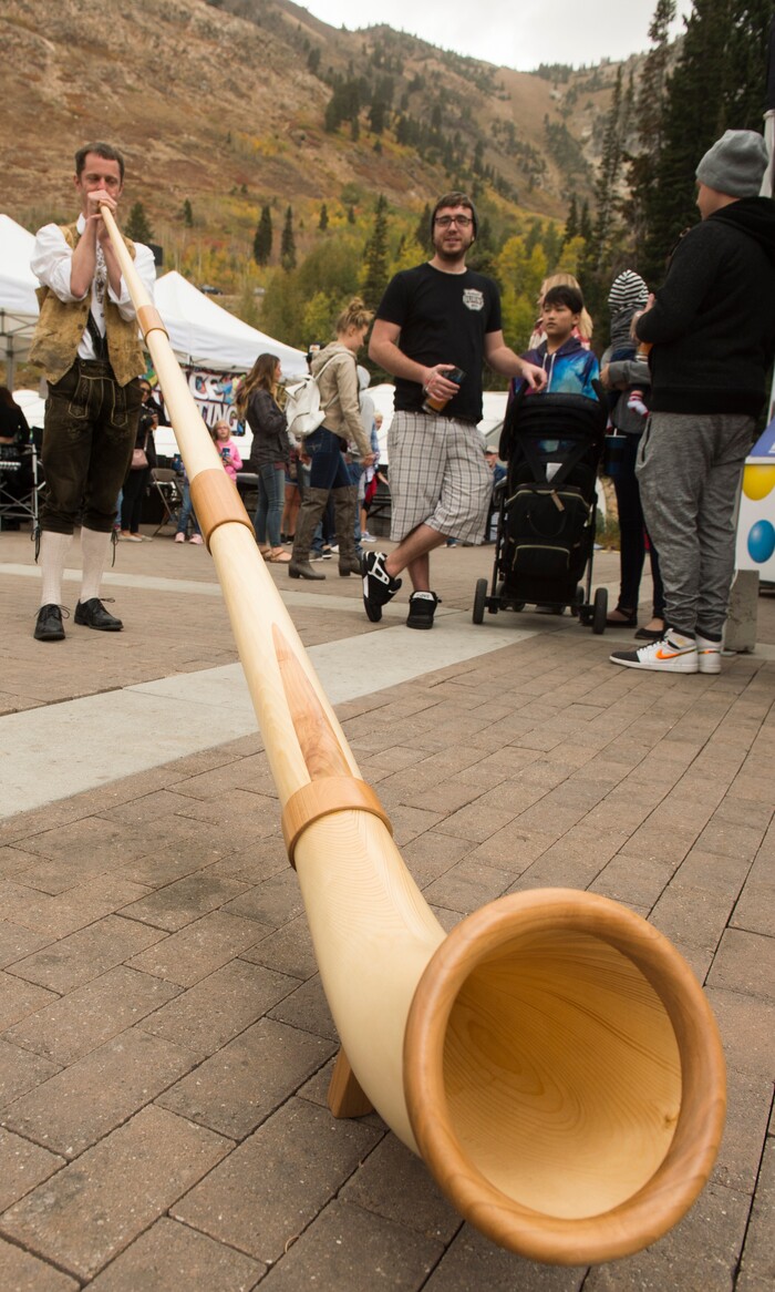 (Rick Egan  |  The Salt Lake Tribune)     Mark Hyper plays an Alphorn on the terrace, during the Oktoberfest celebration at Snowbird. Sunday, Sept. 30, 2018.