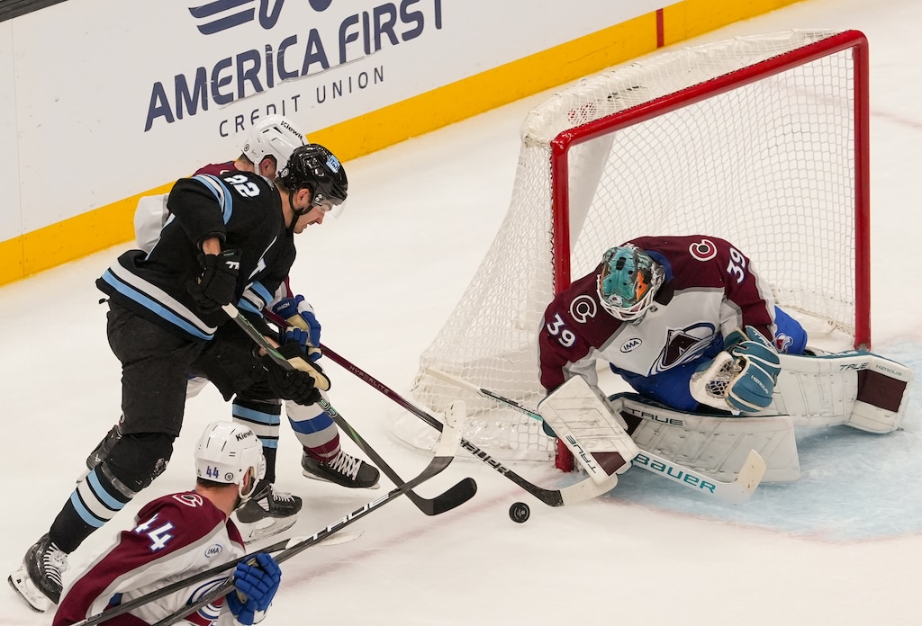 (Chris Samuels | The Salt Lake Tribune) Utah Hockey Club center Jack McBain (22) attempts a shot during an NHL game against the Colorado Avalanche in Salt Lake City, Friday, Dec. 27, 2024.
