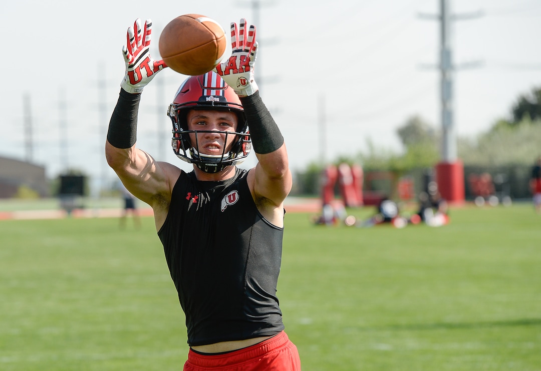 (Francisco Kjolseth  |  The Salt Lake Tribune)  Receiver Britain Covey, #17, runs through drills as the Utah football team takes to the practice field for day one of the season on Wed. Aug. 1, 2018.