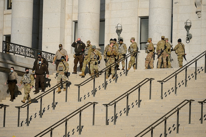 (Trent Nelson | The Salt Lake Tribune) National Guard troops and Highway Patrol at the state Capitol in Salt Lake City on Sunday, Jan. 17, 2021.