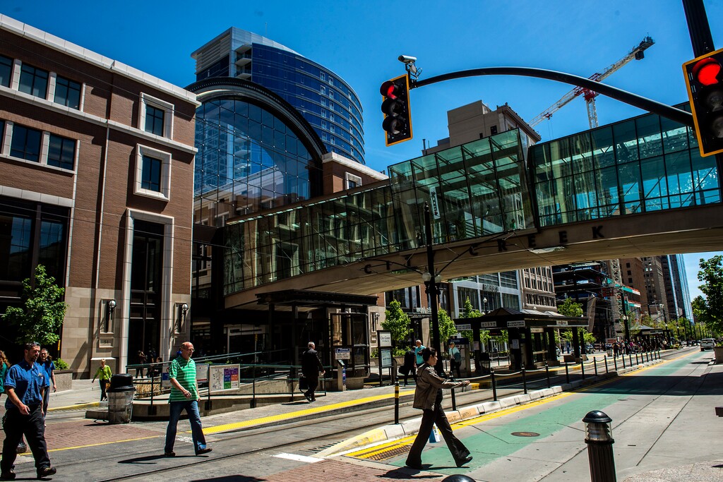 Chris Detrick  |  The Salt Lake TribunePedestrians walk across Main Street by City Creek Center Wednesday April 29, 2015. 