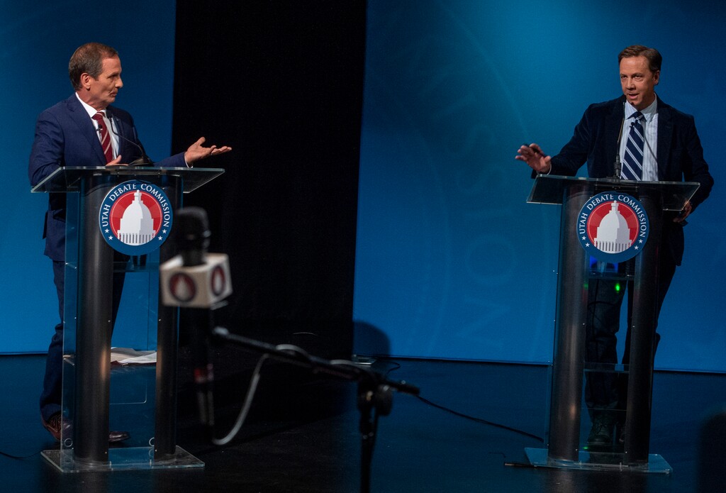 (Rick Egan  |  Tribune file photo)  Republican Rep. Chris Stewart, left, speaks to Democratic challenger Kael Weston during the Utah 2nd Congressional District debate at KSL Studio in Salt Lake City, Oct. 19, 2020. Not pictured is Libertarian J. Robert Latham, who also was on the stage.