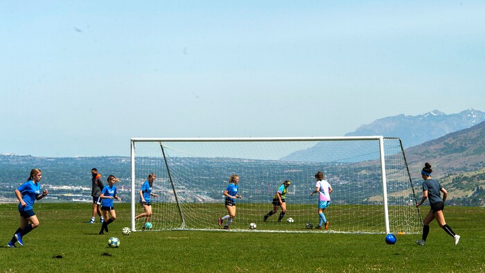 (Rick Egan  |  The Salt Lake Tribune)       A Surf soccer club team practices in Bountiful, Saturday, May 16, 2020.