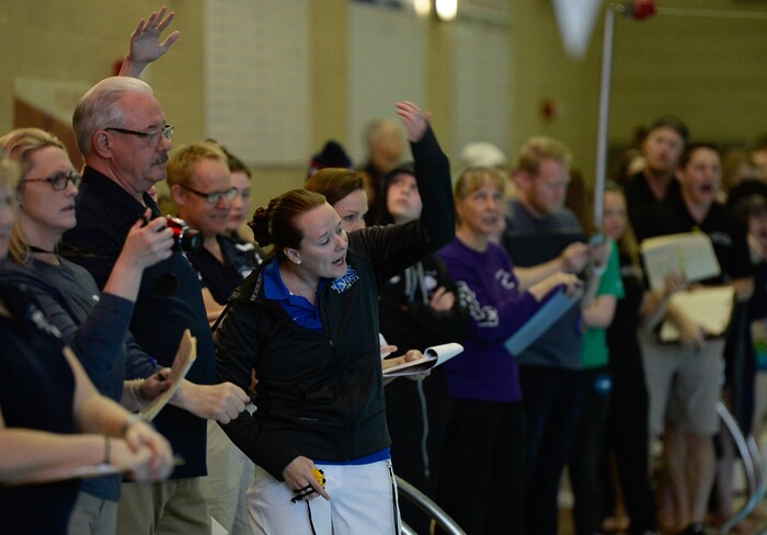 (Francisco Kjolseth  |  The Salt Lake Tribune)  Coaches try to push their swimmers on at the high school swimming 4A State Championships in Bountiful, Friday February 9, 2018.