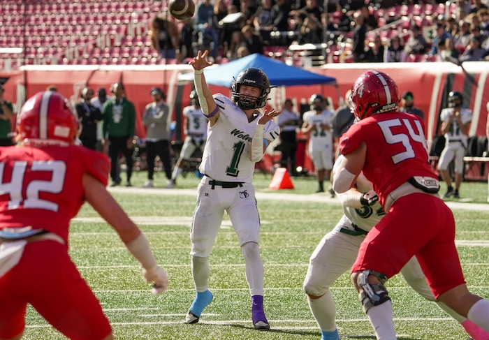 (Chris Samuels | The Salt Lake Tribune) Green Canyon quarterback Payton Wilson (1) attempts a throw during the 4A high school football championship game against Crimson Cliffs at Rice-Eccles Stadium, Friday, Nov. 17, 2023.