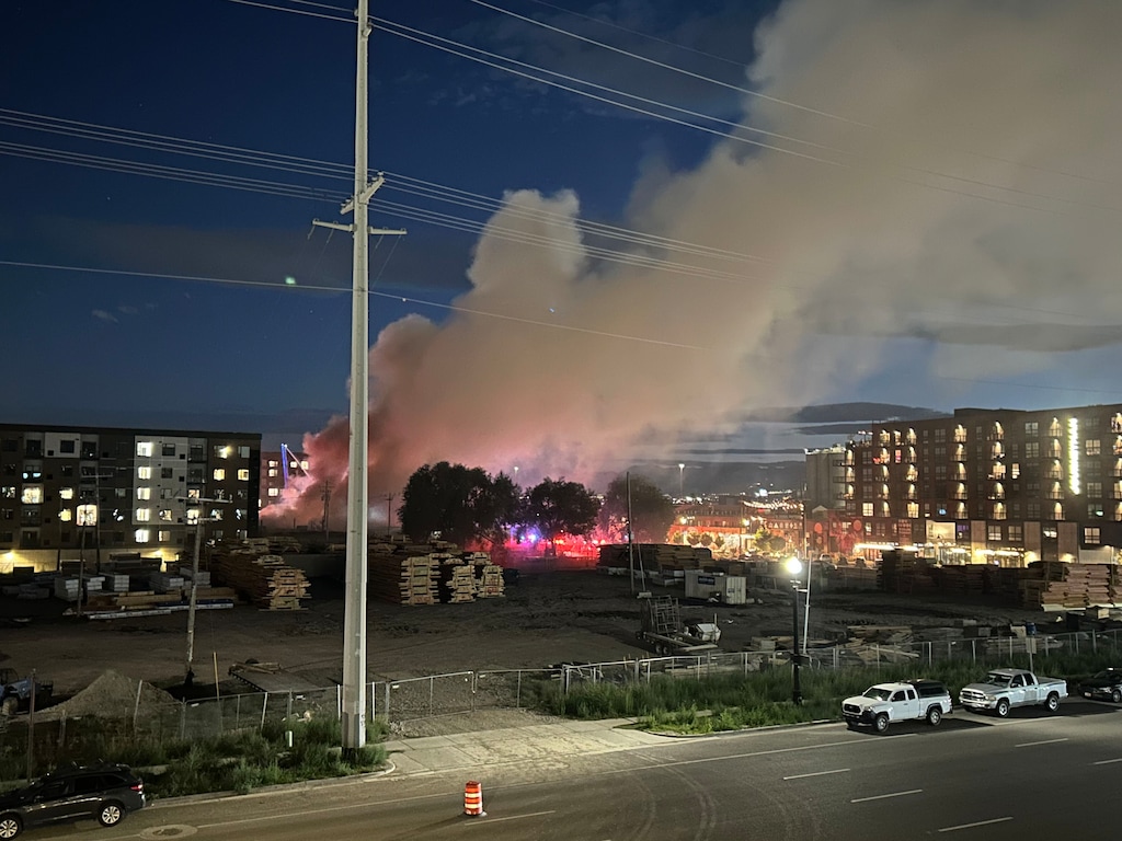(Samantha Moilanen | The Salt Lake Tribune) Smoke rises up from a three-alarm fire in Salt Lake City's Granary District on Sunday, Sept. 27, 2026.