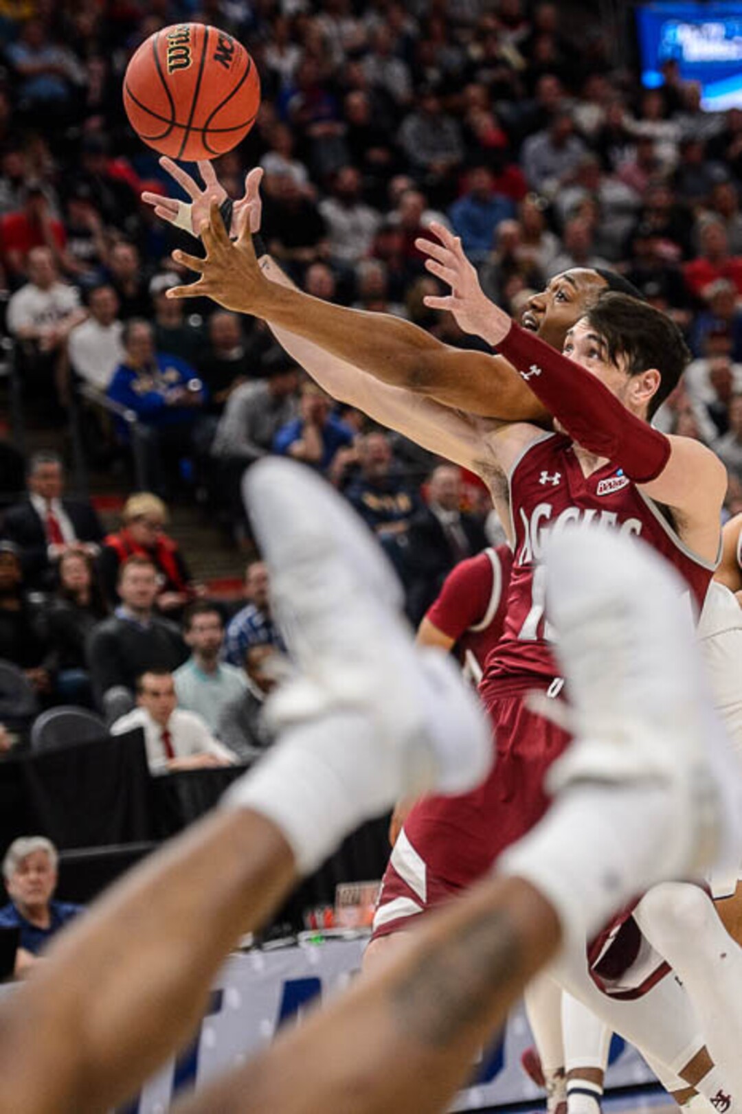 (Trent Nelson | The Salt Lake Tribune)  New Mexico State Aggies forward Ivan Aurrecoechea (15) and Auburn Tigers center Austin Wiley (50) reach for the ball as Auburn faces New Mexico State in the 2019 NCAA Tournament in Salt Lake City on Thursday March 21, 2019.