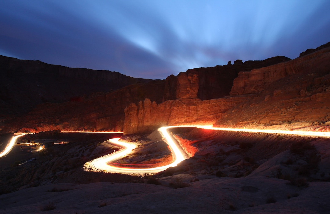 (Francisco Kjolseth | The Salt Lake Tribune) A steady stream of cars leaves Arches National Park following the popular nightly visit to various arches at sunset, most notably Delicate Arch. The infrastructure of Arches National Park was created based on an annual average visitation of 75,000. The park surpassed 1 million visitors in 2010 and is steadily climbing. Officials at Arches are considering options to reduce the number of cars in the park and a shuttle system is one option. However, it would be expensive and, if visitation numbers keep going up, it could soon be obsolete.