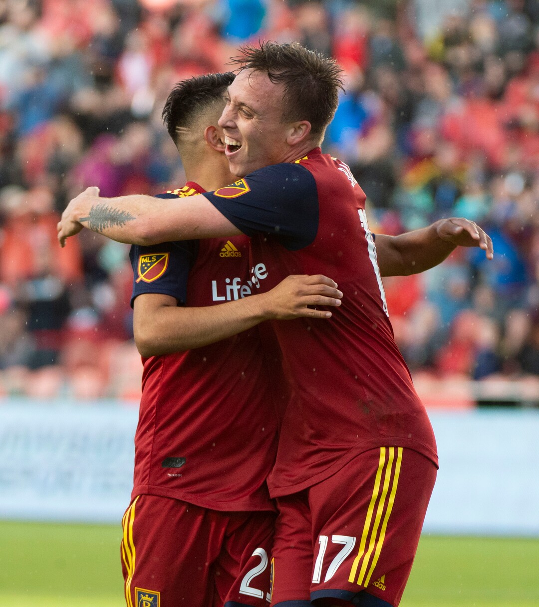 (Rick Egan  |  The Salt Lake Tribune).  Real Salt Lake forward Corey Baird (17) celebrates with Real midfielder Sebastian Saucedo (23) after Saucedo scored a Salt Lake goal, in MLS soccer action between Real Salt Lake and Atlanta United at Rio Tinto Stadium in Sandy, Friday, May 24, 2019.