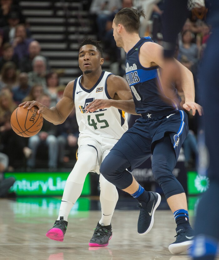 (Rick Egan  |  The Salt Lake Tribune)    Dallas Mavericks guard Kyle Collinsworth (8) guards Utah Jazz guard Donovan Mitchell (45), in NBA action between Utah Jazz and Dallas Mavericks in Salt Lake City, Saturday, Feb. 24, 2018.