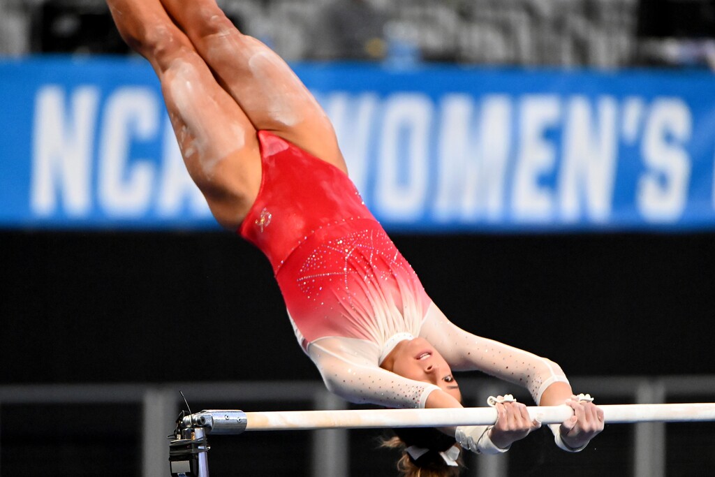 (Matt Strasen | AP) Utah's Emilie LeBlanc performs on the uneven bars during the NCAA Women's Gymnastics Championships in Fort Worth, Texas, Saturday, April 17, 2021.