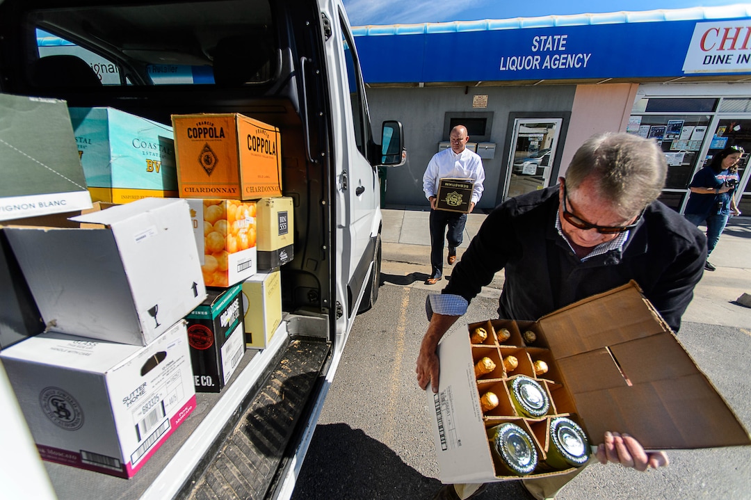 (Trent Nelson | The Salt Lake Tribune)  DABC employees Tim Beardall and Terry Wood remove inventory from the package agency in Tremonton after routine audits showed a string of money losses and consumers lodged repeated complaints about stock availability, Tuesday, Sept. 26, 2017.