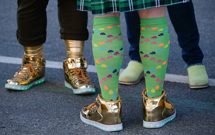 (Francisco Kjolseth | The Salt Lake Tribune) Shamrocks, sunshine and golden shoes were aplenty as Salt Lake CityÕs Irish community celebrates their 41st annual St. PatrickÕs Day Parade with crowds lining up to take in the festivities. Marching bands, Irish dancers, bagpipes and a sea of green moved along 200 South, starting at 500 East Saturday morning en route to State street where the Siamsa festivities kept the fun going at the Gallivan Center.