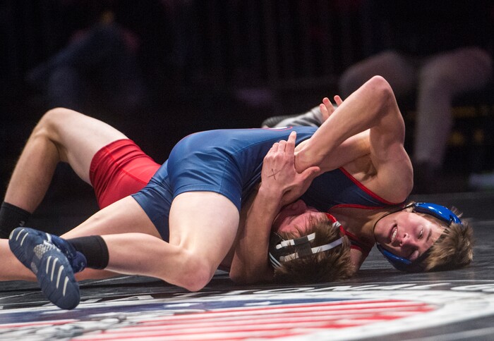 (Rick Egan  |  The Salt Lake Tribune)   Quenton Mortimer (American Leadership Academy) wrestles Triston Fillmore (South Sevier) in the 3A State Wrestling Championship at UVU in Orem, Saturday, February 10, 2018.