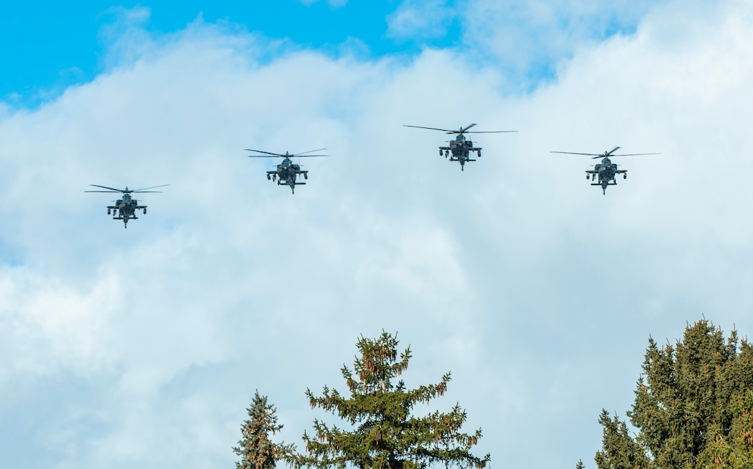 (Rick Egan  |  The Salt Lake Tribune)  Military aircraft perform a flyover at the Brigham City Cemetery,  Monday, Dec. 9, 2019, during the graveside service for Army Chief Warrant Officer 2 Kirk T. Fuchigami Jr., who was killed in Afghanistan last month.